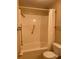 Clean, standard tub and shower combo with toilet and safety bars at 5623 80Th N St # 314, St Petersburg, FL 33709