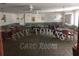 A view of the card room. There are multiple tables in the room at 5623 80Th N St # 314, St Petersburg, FL 33709