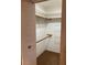 Walk-in closet features double hang and shoe storage, maximizing organization and space at 5623 80Th N St # 314, St Petersburg, FL 33709