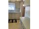 Cozy kitchen featuring a dishwasher and a window for natural light at 5623 80Th N St # 314, St Petersburg, FL 33709