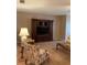 Living room with entertainment center, and comfortable seating at 5623 80Th N St # 314, St Petersburg, FL 33709