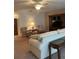 Living room showcasing stylish chairs and an entertainment center for cozy relaxation at 5623 80Th N St # 314, St Petersburg, FL 33709