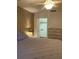 Spacious bedroom with a ceiling fan, a closet, and a dresser, ensuring functionality and style at 5623 80Th N St # 314, St Petersburg, FL 33709
