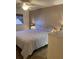 Comfortable main bedroom featuring a ceiling fan and a serene atmosphere at 5623 80Th N St # 314, St Petersburg, FL 33709