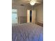 Cozy bedroom featuring a ceiling fan, two dressers, and closet access, offering ample storage at 5623 80Th N St # 314, St Petersburg, FL 33709