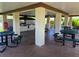 Outdoor picnic area with tables, grill, and seating under a shaded pavilion at 5925 Terrace Park N Dr # 210, St Petersburg, FL 33709