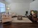 Comfortable living room with stylish furnishings and a large window for natural light at 5925 Terrace Park N Dr # 210, St Petersburg, FL 33709