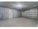 A spacious two car garage with an automatic door and plenty of room for parking and storage at 5998 8Th S St, St Petersburg, FL 33705