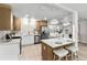 Beautiful kitchen featuring stainless steel appliances, white countertops, and modern lighting at 5998 8Th S St, St Petersburg, FL 33705