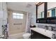 Comfortable bathroom offers neutral tile, updated vanity and tub with shower at 6932 Stones Throw N Cir # 7101, St Petersburg, FL 33710