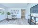 Dining room with modern décor and view of the backyard at 8001 N Highland Ave, Tampa, FL 33604