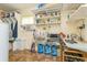 This utility room provides lots of storage, a workspace and tiled floors at 8014 27Th N Ave, St Petersburg, FL 33710