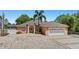 Charming single-story home featuring a spacious driveway and a well-manicured lawn at 8105 N Grady Ave, Tampa, FL 33614