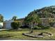 Charming single-story home with well-maintained lawn and mature trees, and a one car garage at 103 9Th St, Belleair Beach, FL 33786