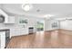Open kitchen with stainless steel appliances and plenty of natural light overlooking backyard at 10523 Boyette Creek Blvd, Riverview, FL 33569
