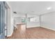 Spacious living room featuring hardwood floors, recessed lighting, and neutral paint at 10523 Boyette Creek Blvd, Riverview, FL 33569