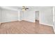 Large main bedroom with an en-suite bathroom and a ceiling fan at 10523 Boyette Creek Blvd, Riverview, FL 33569