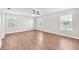 Spacious main bedroom featuring lots of natural light and a ceiling fan at 10523 Boyette Creek Blvd, Riverview, FL 33569