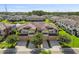 Beautiful two-story townhome with a two-car garage, well-manicured lawn, and balcony at 11519 Crowned Sparrow Ln, Tampa, FL 33626