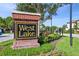 West Lake community sign, made of brick, complemented by vibrant landscaping, marking the entrance to the neighborhood at 11519 Crowned Sparrow Ln, Tampa, FL 33626