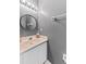 Powder room featuring tile flooring, modern sink and vanity, and grey paint at 12910 Vicksburg Dr, Tampa, FL 33625