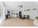 Expansive living area with a combined living room, kitchen, and dining space, designed for modern living and entertaining at 12910 Vicksburg Dr, Tampa, FL 33625