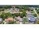 A vast neighborhood with tree-lined streets and well-maintained homes nestled among lush greenery at 13337 Tubeck St, Spring Hill, FL 34609