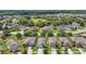 Neighborhood aerial view showcasing the home's location within a lush, green community at 13806 Reindeer Cir, Hudson, FL 34669