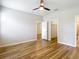 This bedroom features new flooring and a walk-in closet at 13806 Reindeer Cir, Hudson, FL 34669