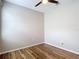 This bedroom features new flooring, light gray walls, and new blinds at 13806 Reindeer Cir, Hudson, FL 34669