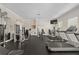 Community fitness center with modern exercise equipment and a mirrored wall at 13806 Reindeer Cir, Hudson, FL 34669