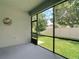Enjoy the view of your backyard from this peaceful screened patio at 13806 Reindeer Cir, Hudson, FL 34669