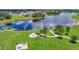 Community pond has a picnic area and a dock to enjoy the water view at 13806 Reindeer Cir, Hudson, FL 34669