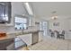 Modern kitchen with stainless steel appliances, wood counters, and subway tile backsplash at 1426 Gerard Ln, Holiday, FL 34690