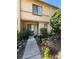 Charming townhome with a well maintained front yard and walkway leading to the entrance at 1448 Highland Ridge Cir, Brandon, FL 33510