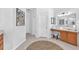 Bright bathroom featuring a vanity, a makeup counter, and neutral colors at 15206 Merlinpark Pl, Lithia, FL 33547