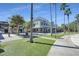 Charming mixed-use building with retail space, outdoor dining, and lush landscaping at 15206 Merlinpark Pl, Lithia, FL 33547
