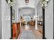 Elegant foyer with tile flooring, columns, and an open view of the living area at 15206 Merlinpark Pl, Lithia, FL 33547