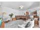 Spacious living room with comfortable seating and an open view of the kitchen at 15206 Merlinpark Pl, Lithia, FL 33547