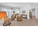 Open living area featuring neutral decor, tile floors, and an inviting atmosphere at 15206 Merlinpark Pl, Lithia, FL 33547