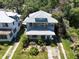 Aerial view showing the home's architecture, roof, and surrounding greenery at 2355 Trelain S Dr, St Petersburg, FL 33712