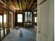 Room featuring exposed walls and beams and view to window and doorway at 2355 Trelain S Dr, St Petersburg, FL 33712