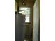 Utility room features a water heater, a window, and a door to the exterior at 2355 Trelain S Dr, St Petersburg, FL 33712