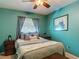 Serene bedroom showcasing a plush bed and decorative window treatments that add a touch of elegance at 31096 Inwood Cir, Brooksville, FL 34602