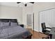 Relaxing bedroom includes hardwood floors and an ensuite bathroom at 3718 Beneraid St, Land O Lakes, FL 34638