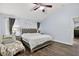 Bright bedroom with wood floors and a decorative ceiling fan at 3718 Beneraid St, Land O Lakes, FL 34638