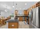 Kitchen with ample cabinet space, stainless steel appliances, and a breakfast nook at 3718 Beneraid St, Land O Lakes, FL 34638
