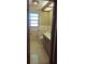 Compact bathroom featuring neutral tile, fixtures and lighting, offering a functional space at 401 Fern Cliff Ave, Temple Terrace, FL 33617