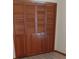 Large closet with bi-fold doors, maximizing storage space and organizational convenience at 401 Fern Cliff Ave, Temple Terrace, FL 33617