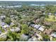 This aerial view shows a tranquil residential community nestled amidst serene natural landscapes at 408 Georgia Ave, Crystal Beach, FL 34681